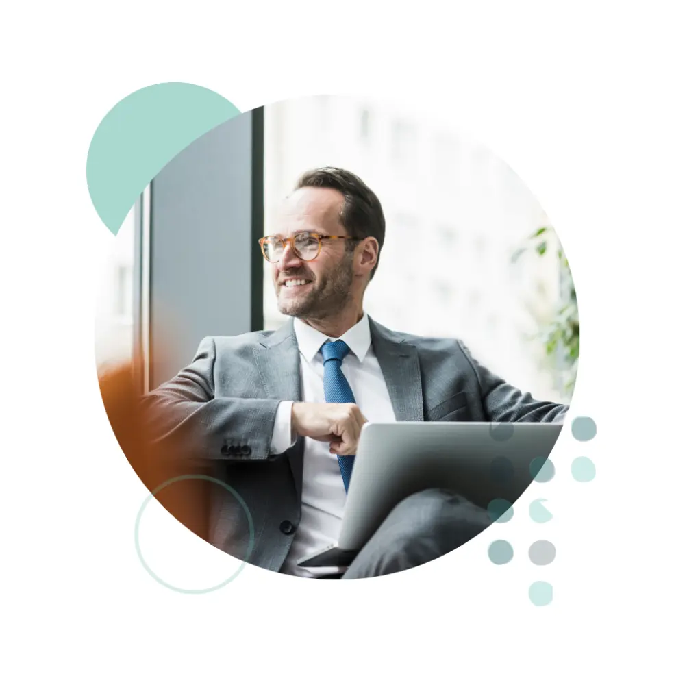 Businessman working on laptop composite