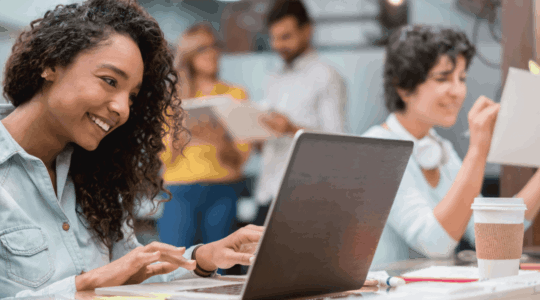 woman-smiling-with-laptop